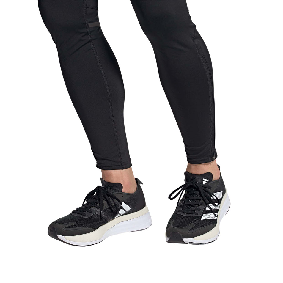Model view of men's adidas adizero boston 11 running shoes in black (7510265299106)