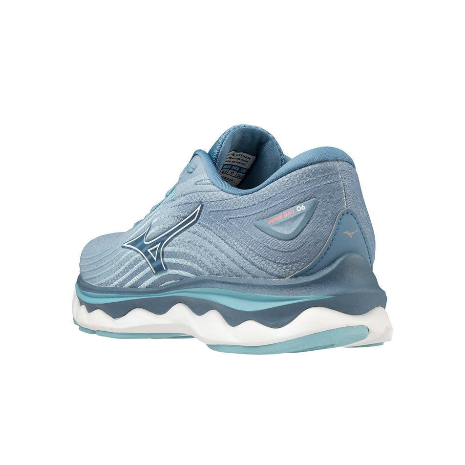 Posterior angled view of Mizuno Women's Wave Sky 6 Running Shoes in blue. (7599152693410)