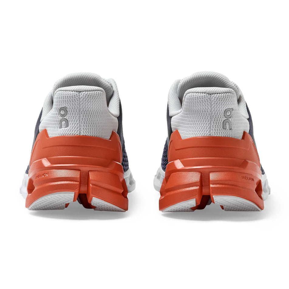 Heel counter and Helion crash pads on the right and left shoes from a pair of men's On Running Cloudflyer (6888441118882)