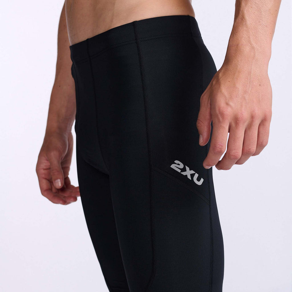 Lateral left side of a pair of 2XU Men's Aero Compression Shorts, being worn by a model (7778319859874)