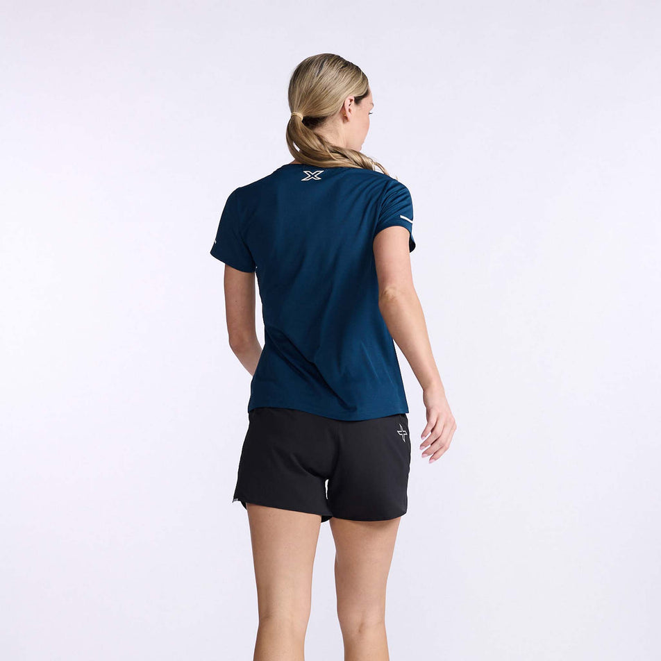 Back view of a model wearing a 2XU Women's Aero Tee (7778490515618)
