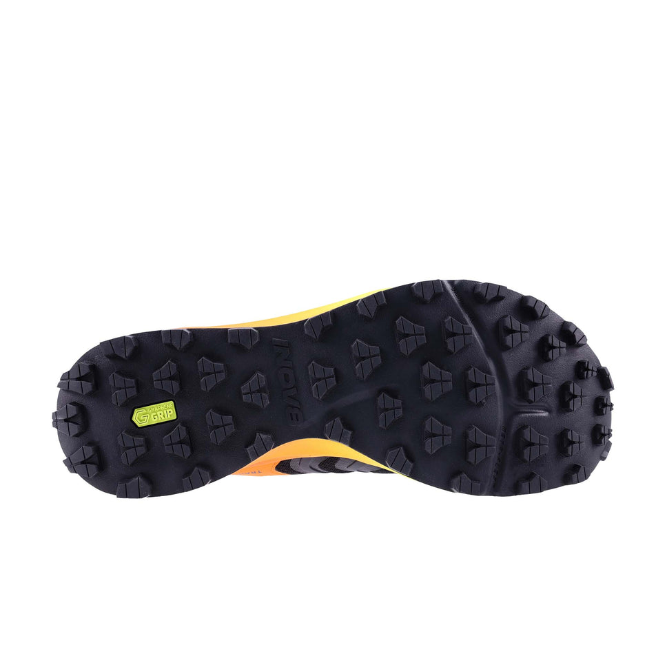 The outsole of the right shoe from a pair of INOV8 Men's Trailtalon Max Running Shoes in the Black/Orange/Lime colourway.