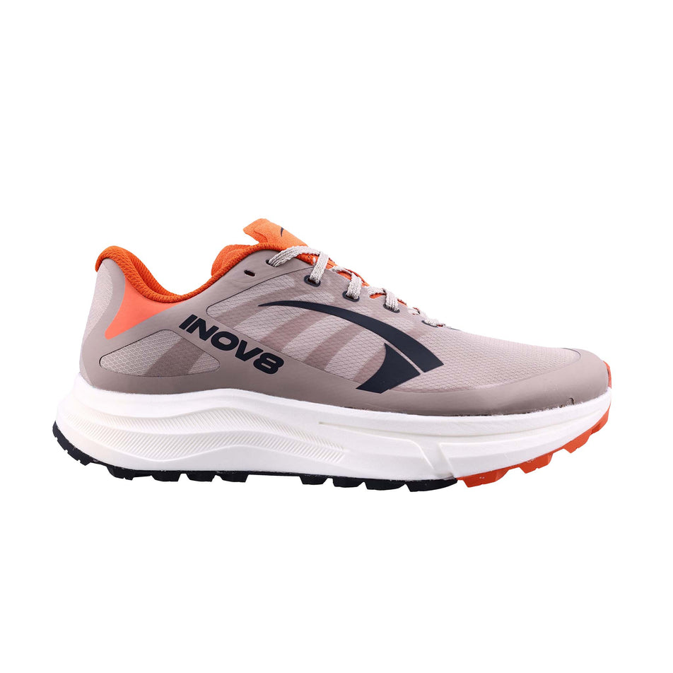 Lateral view of the right shoe from a pair of INOV8 Women's TrailFly Pro Running Shoes in the Light Brown/Orange colourway.