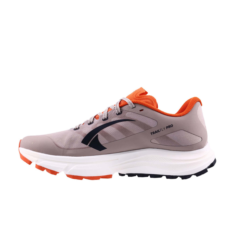 Medial view of the right shoe from a pair of INOV8 Women's TrailFly Pro Running Shoes in the Light Brown/Orange colourway.