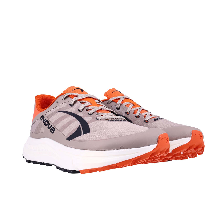 A pair of INOV8 Women's TrailFly Pro Running Shoes in the Light Brown/Orange colourway.