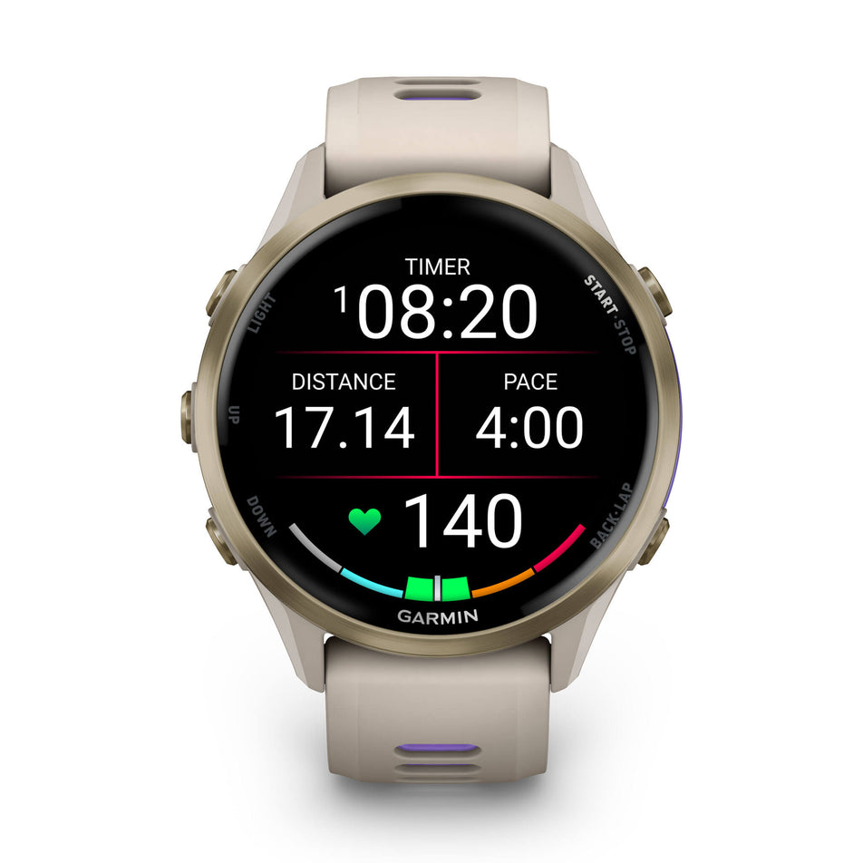 A Garmin Forerunner 970. Soft Gold Titanium with French Grey Case and French Grey/Translucent Indigo Band. Mid-activity stats screen. (8692403962018)