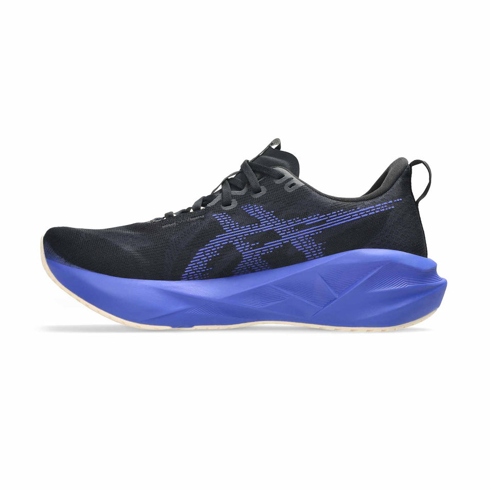 Medial view of the right shoe from a pair of ASICS Men's Novablast 5 Running Shoes in the Black/Cobalt Burst colourway.