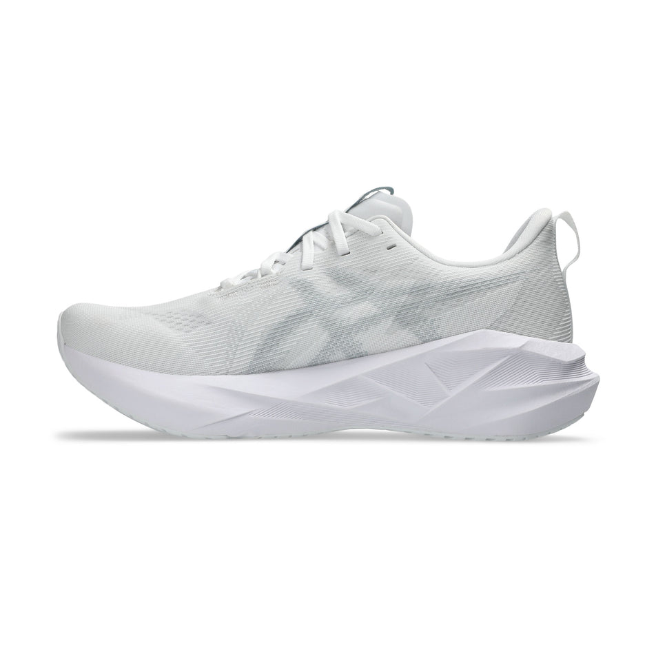 Medial view of the right shoe from a pair of ASICS Men's Novablast 5 Running Shoes in the White/Piedmont Grey colourway.
