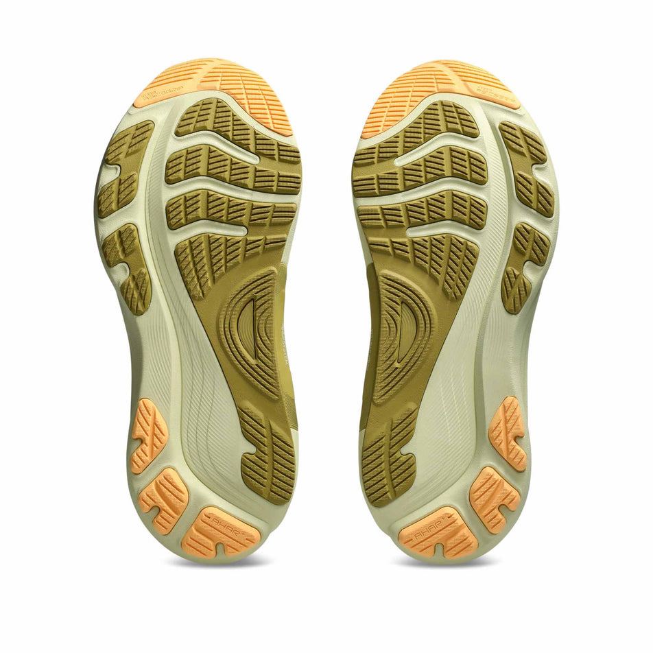 The outsoles of a pair of ASICS Men's Gel-Kayano 32 Running Shoes in the White/Orange Glow colourway. (8668545679522)