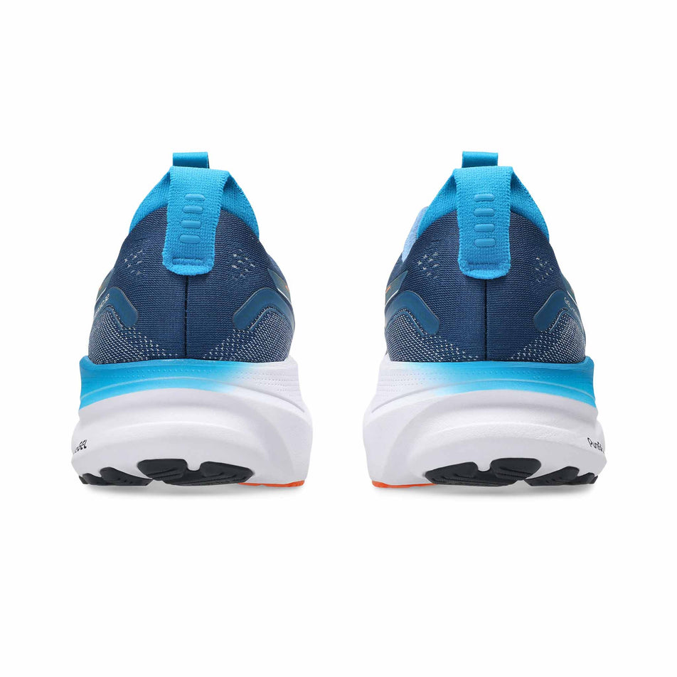 The back of a pair of ASICS Men's Gel-Kayano 32 Running Shoes in the Twilight Blue/Anzu colourway.