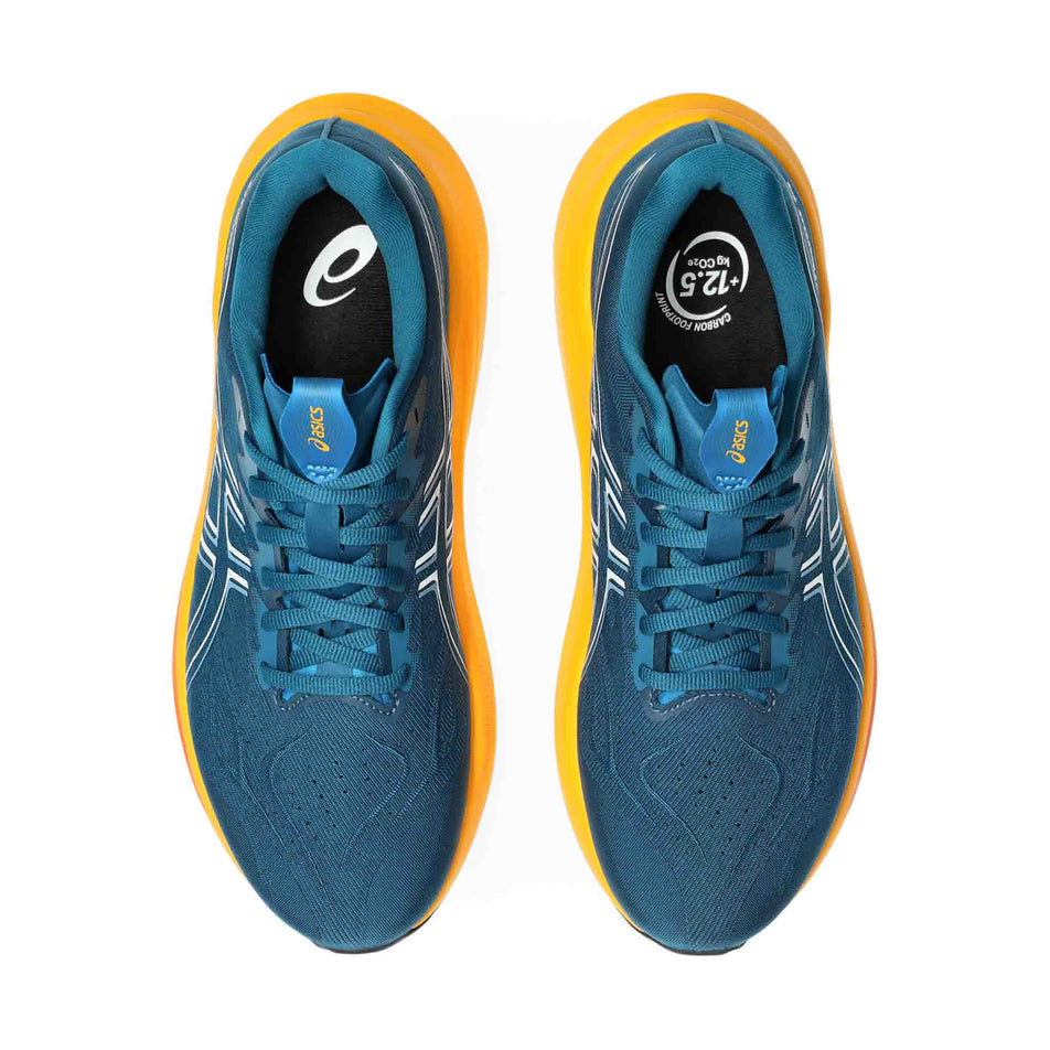 The uppers of a pair of ASICS Men's GT-2000 14 Running Shoes in the Dark Teal/White colourway.