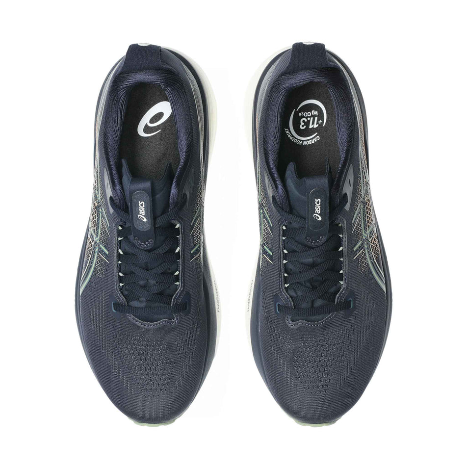The uppers of a pair of ASICS Men's Gel-Kayano 33 Running Shoes in the Midnight/Khaki Green colourway.