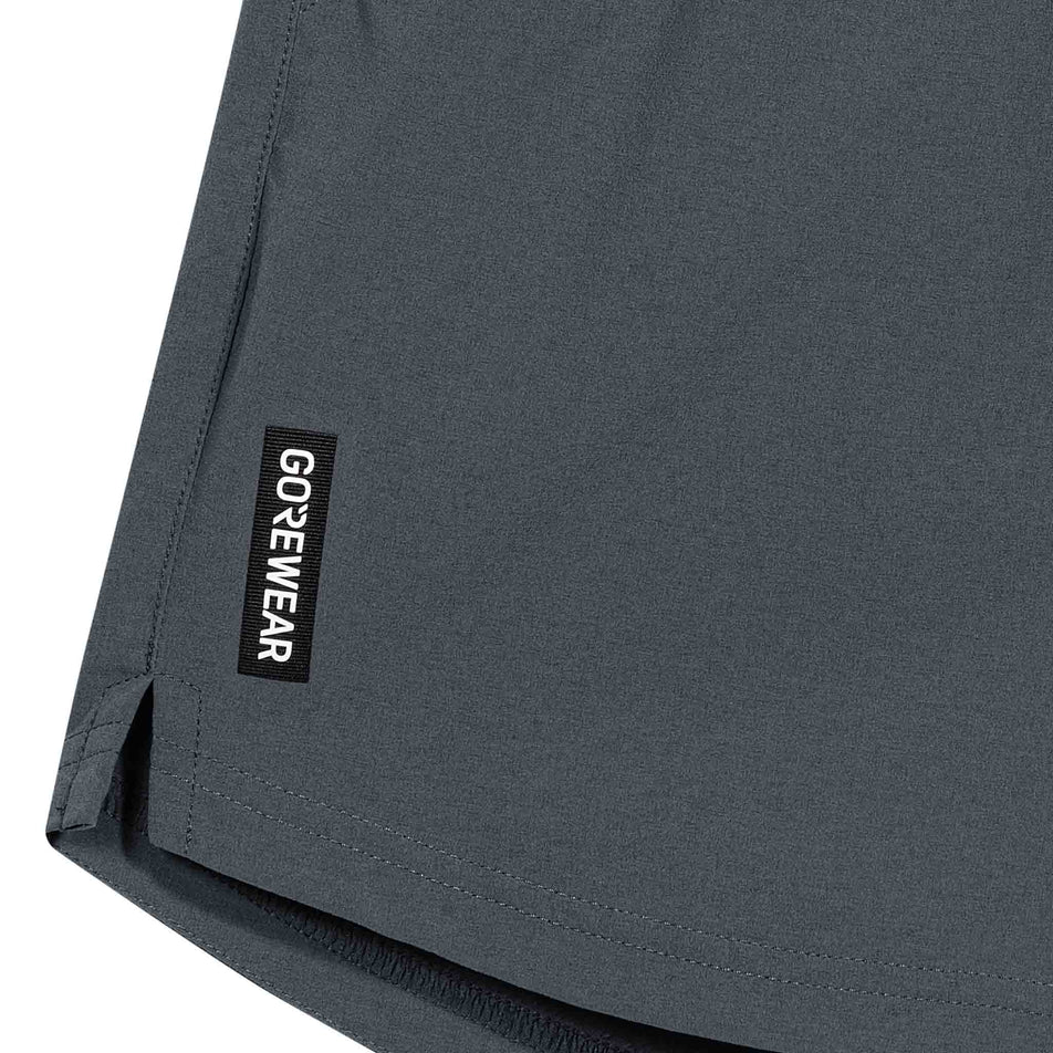 Close-up view of the GORWEAR logo on the GOREWEAR  Women's Training Shorts in the Lab Graphite colourway.