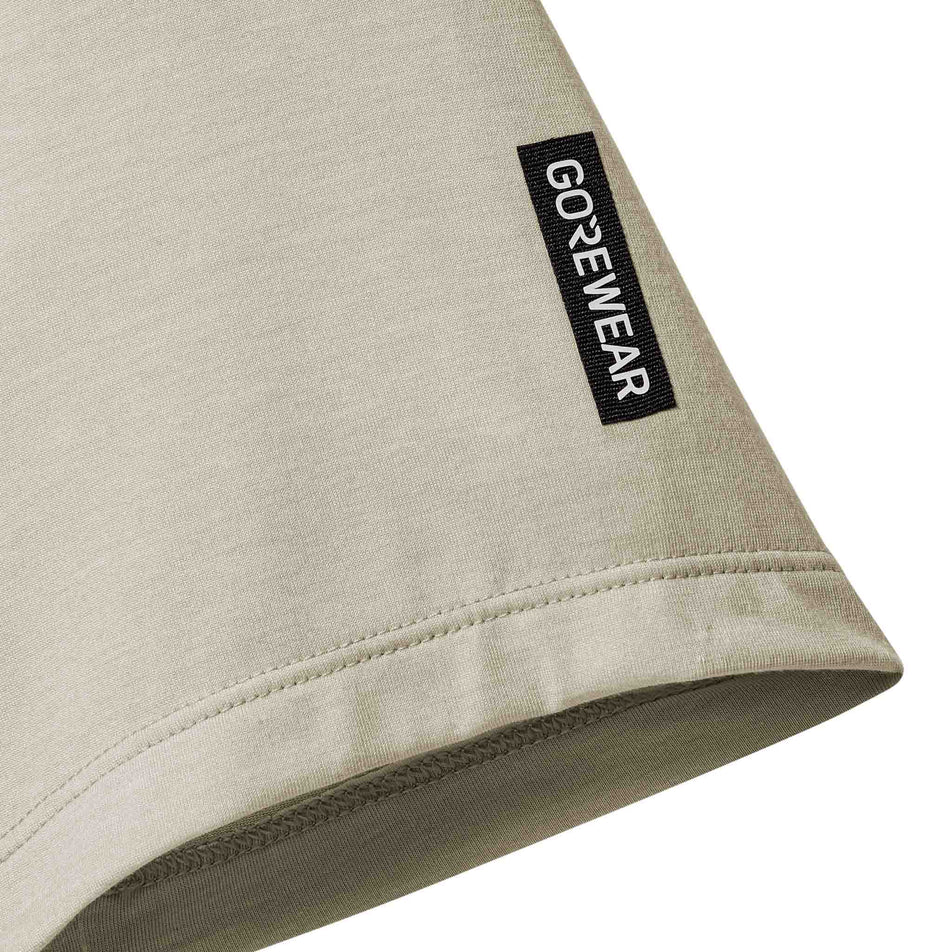 Close-up view of the sleeve of the GOREWEAR Men's Training Tee in the Tech Beige colourway.