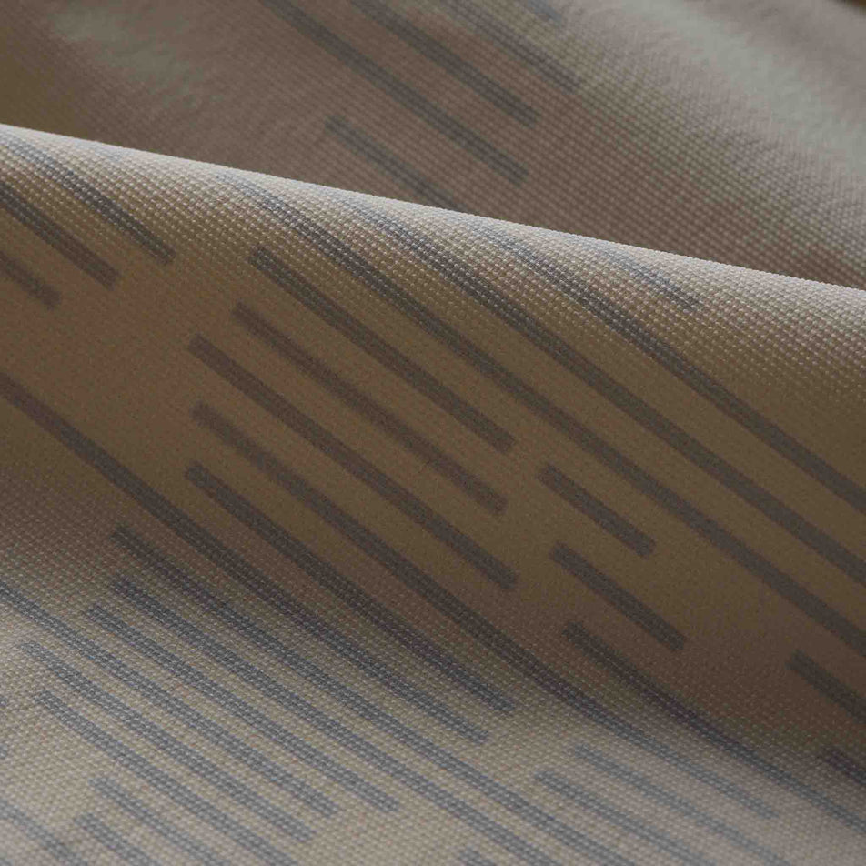 Close-up view of the fabric of the GOREWEAR Men's Concurve Electro Windbreaker in the Crushed Tech Beige/Lab Gray colourway.