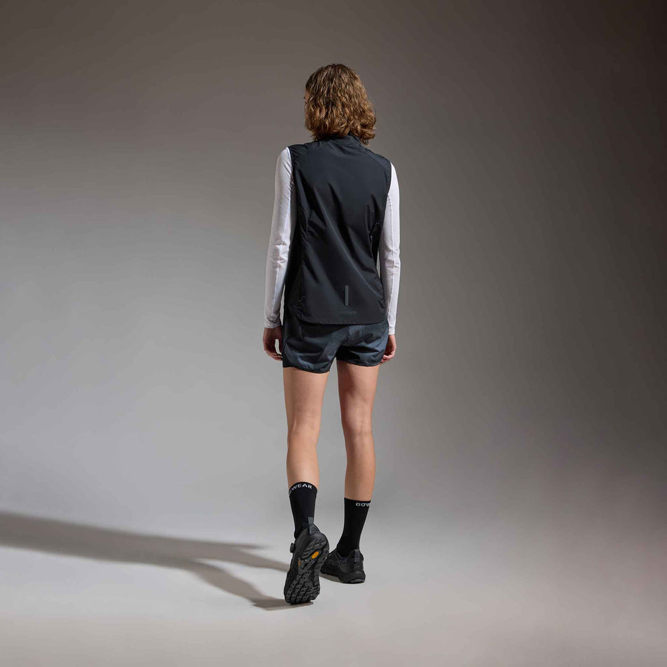Back view of a model wearing the GOREWEAR Women's Concurve 3