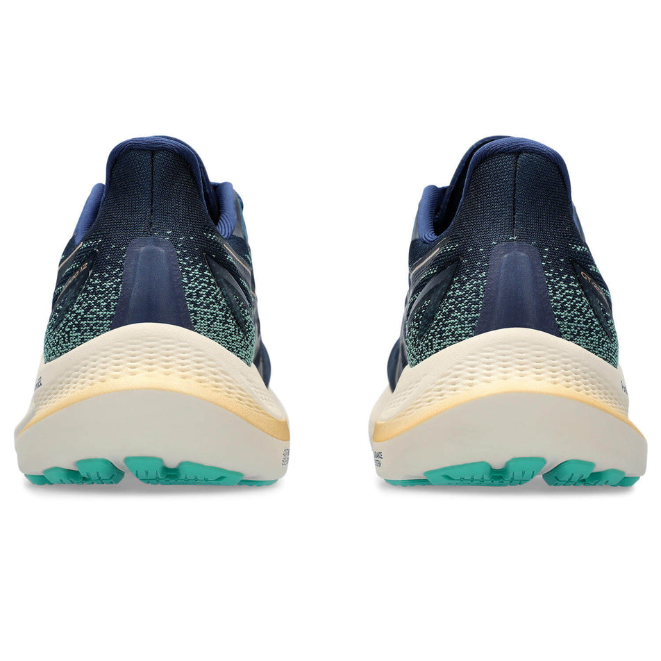 The back of a pair of Asics Women's GT-2000 12 Running Shoes in the Blue Expanse/Champagne colourway (8232994242722)