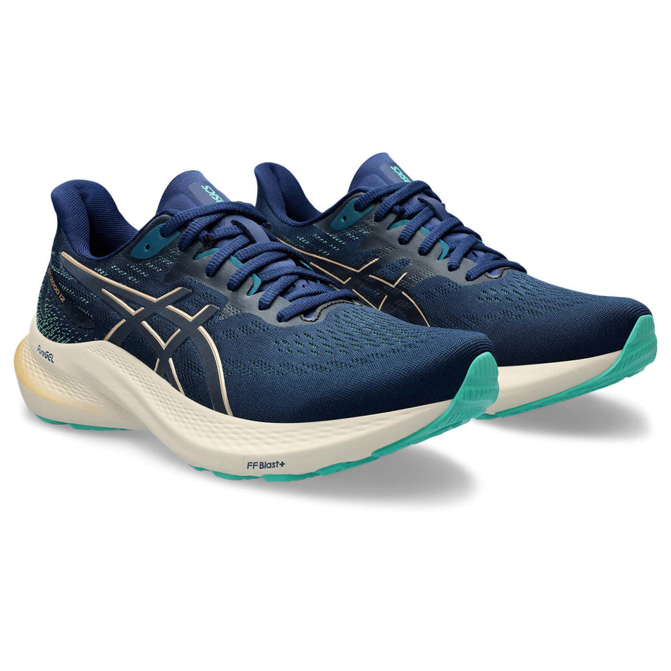 A pair of Asics Women's GT-2000 12 Running Shoes in the Blue Expanse/Champagne colourway (8232994242722)
