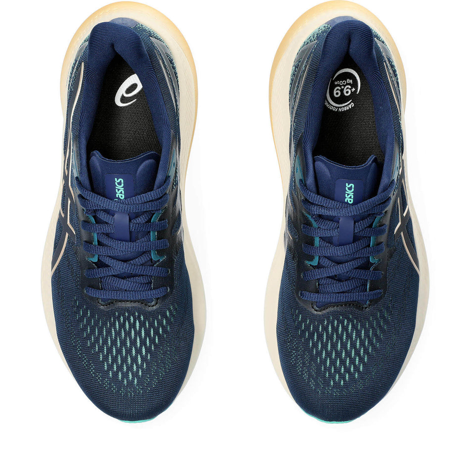 The uppers on a pair of Asics Women's GT-2000 12 Running Shoes in the Blue Expanse/Champagne colourway (8232994242722)
