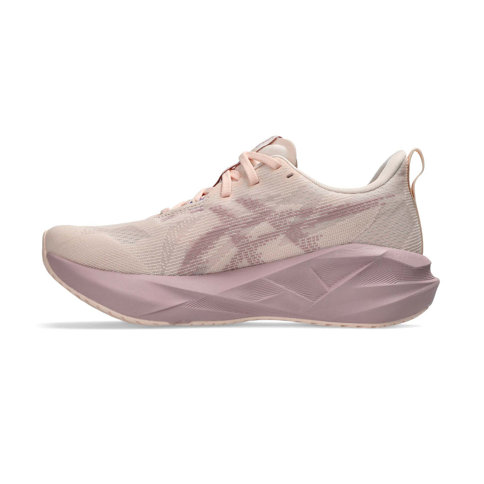 Medial view of the right shoe from a pair of ASICS Women's Novablast 5 Running Shoes in the Pearl/Morganite colourway.