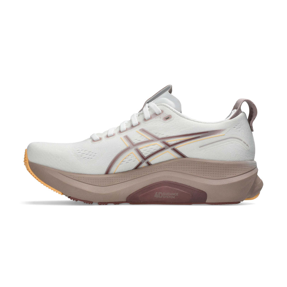 Medial view of the right shoe from a pair of ASICS Women's Gel-Kayano 32 Running Shoes in the White/Orange Glow colourway. (8669086384290)