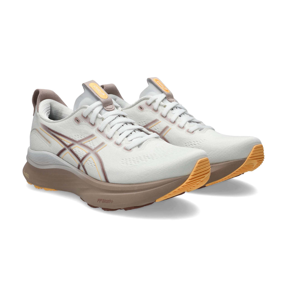 A pair of ASICS Women's Gel-Kayano 32 Running Shoes in the White/Orange Glow colourway. (8669086384290)