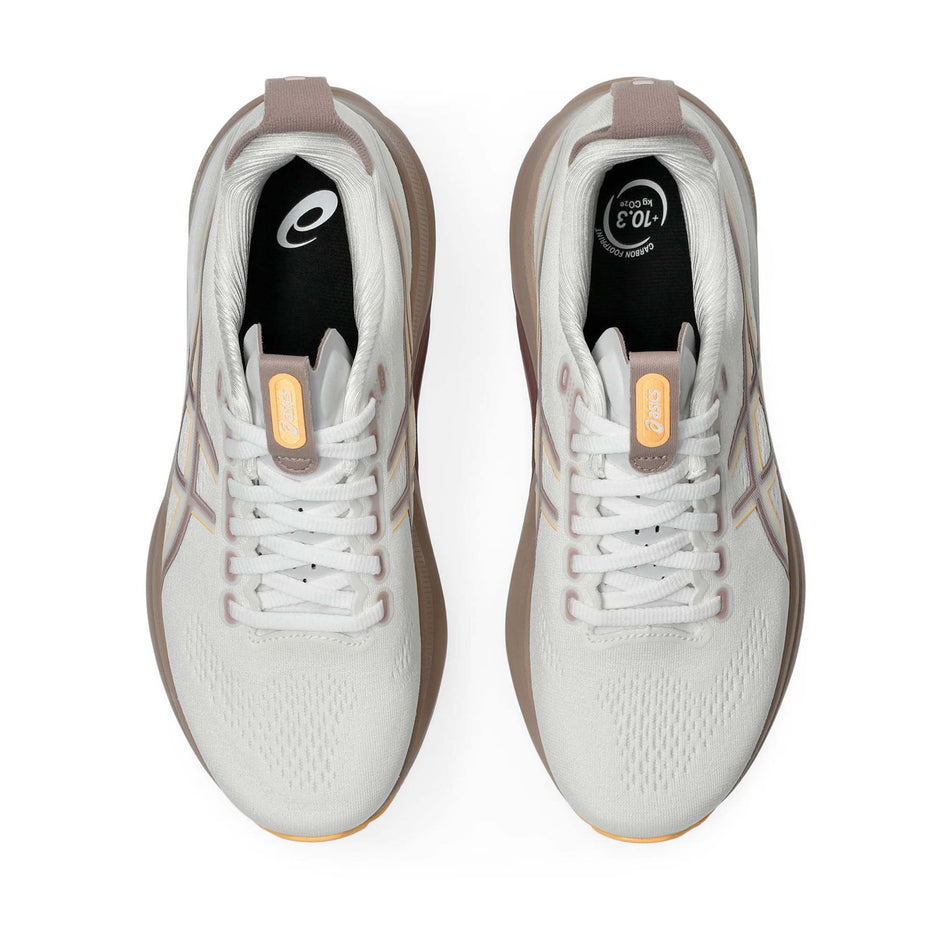 The uppers of a pair of ASICS Women's Gel-Kayano 32 Running Shoes in the White/Orange Glow colourway. (8669086384290)
