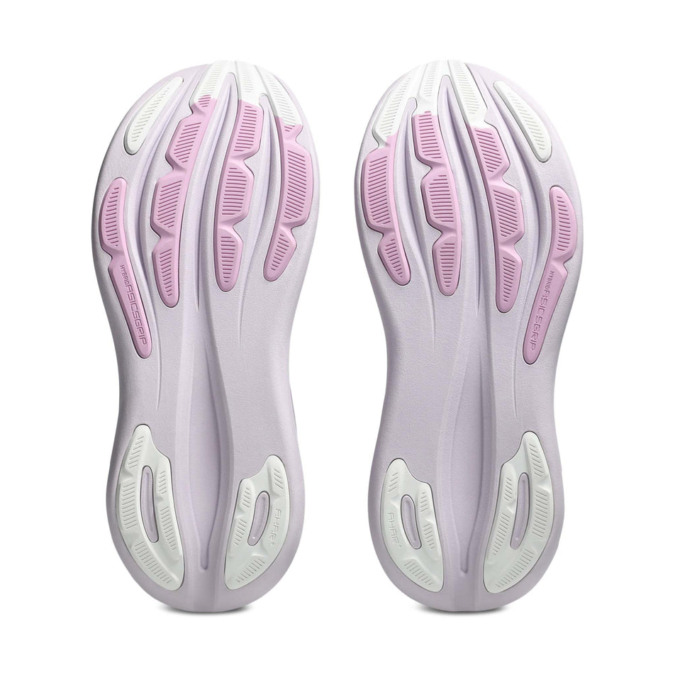 The outsoles of a pair of ASICS Women's Gel-Nimbus 28 Running Shoes in the Dahlia/White colourway.