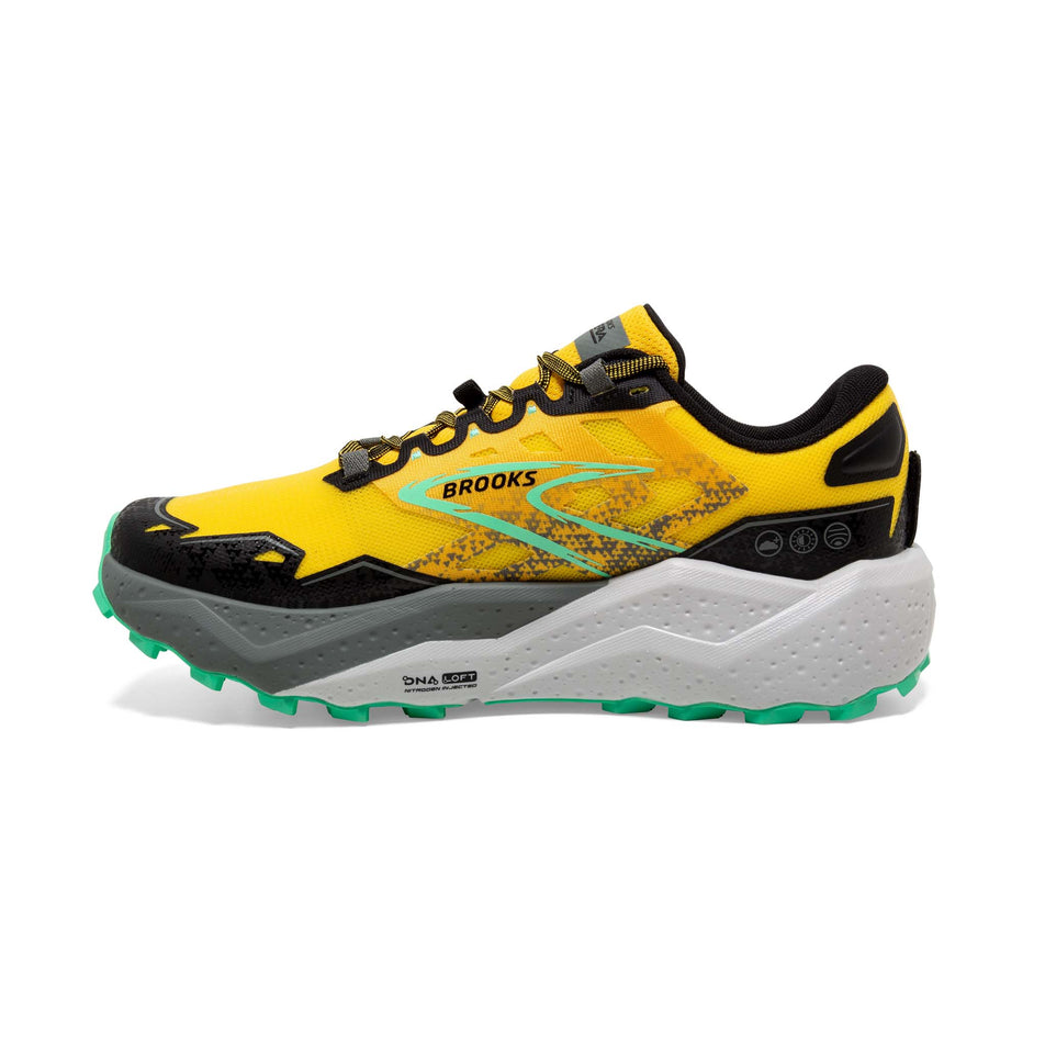 Medial side of the right shoe from a pair of Brooks Men's Caldera 7 Running Shoes in the Lemon Chrome/Black/Sedona Sage colourway (8113636573346)