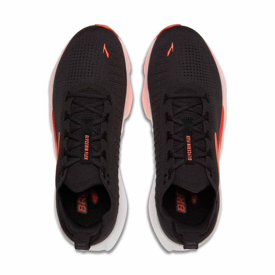 The uppers of a pair of Brooks Men's Glycerin Flex Running Shoes in the Black/Orange colourway.