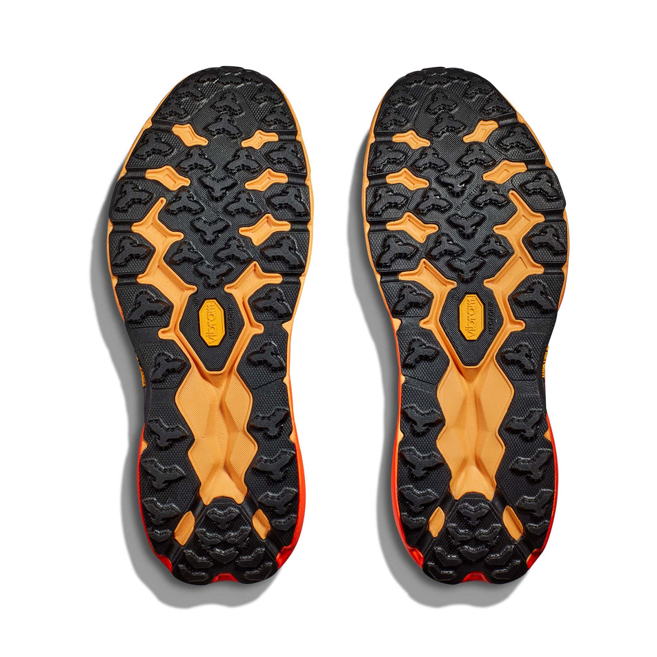 The outsoles on a pair of Hoka Men's Speedgoat 5 Running Shoes in the Castlerock/Flame colourway (7922042994850)