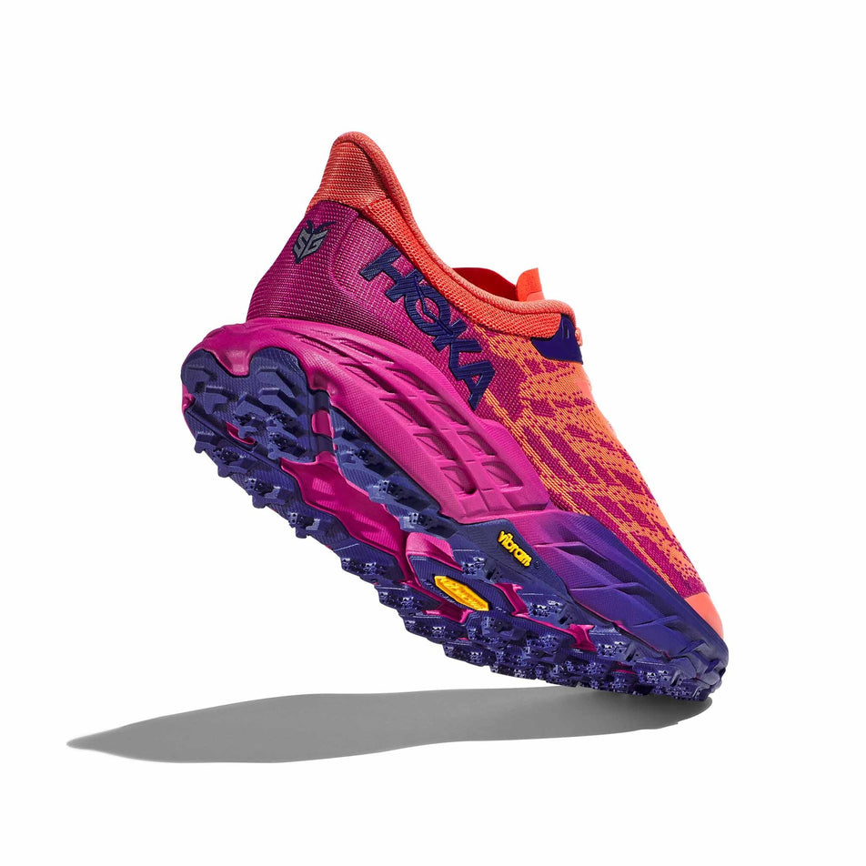A view of the outsole on the right shoe from a pair of HOKA Women's Speedgoat 5 Running Shoes in the Festival Fuschia/Camellia colourway (8246545219746)