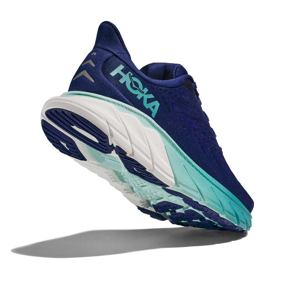 A view of the majority of the outsole on the right shoe from a pair of Hoka Women's Arahi 6 Running Shoes in the Bellweather Blue/Ocean Mist colourway (7922056003746)