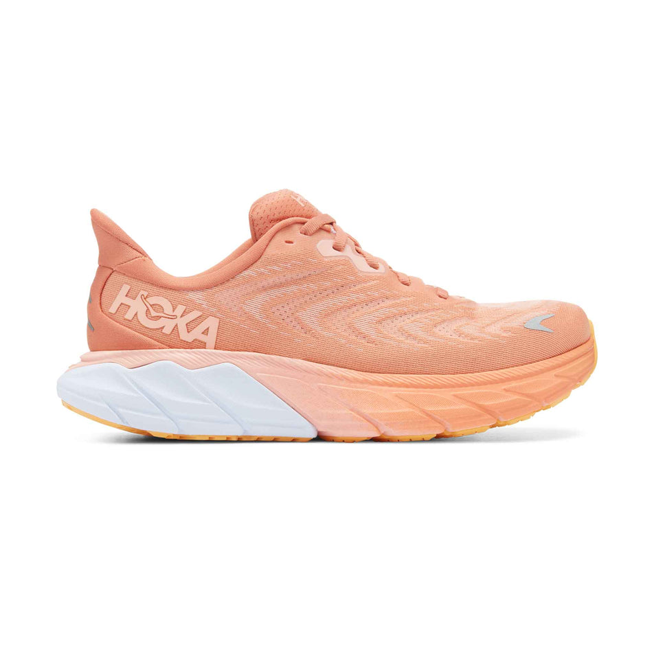 Lateral side of the right shoe from a pair of HOKA Women's Arahi 6 Running Shoes in the Sun Baked/Shell Coral colourway (8044976701602)