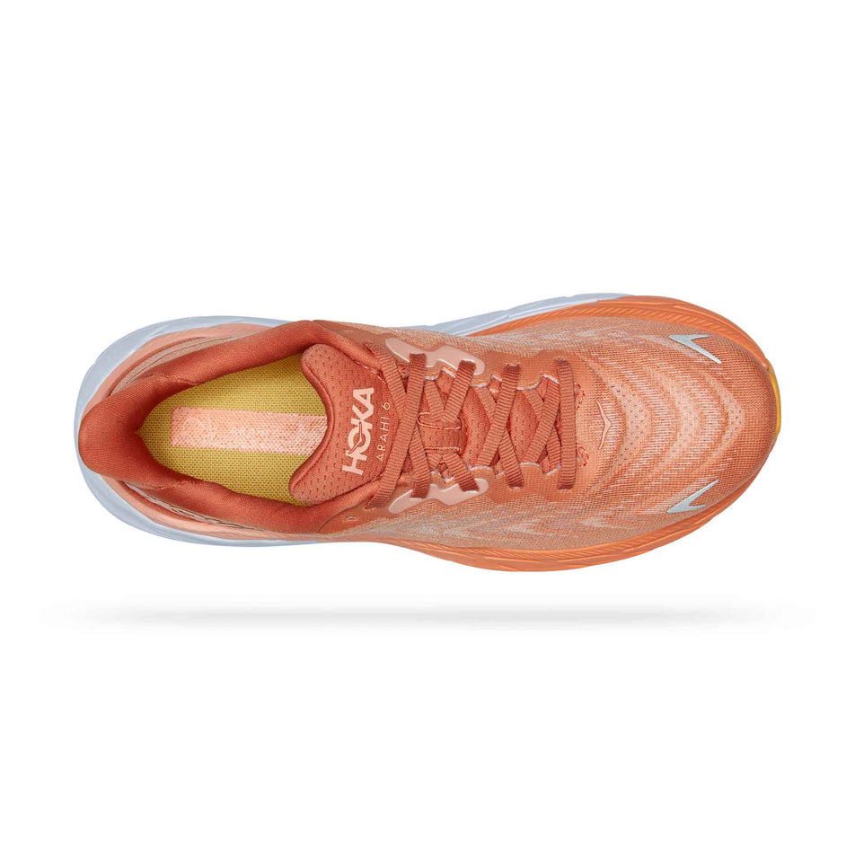 The upper of the right shoe from a pair of HOKA Women's Arahi 6 Running Shoes in the Sun Baked/Shell Coral colourway (8044976701602)