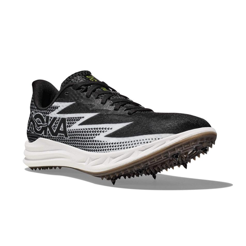 Lateral side of the right shoe from a pair of HOKA Unisex Crescendo MD Running Spikes in the Black/White colourway (8232934899874)