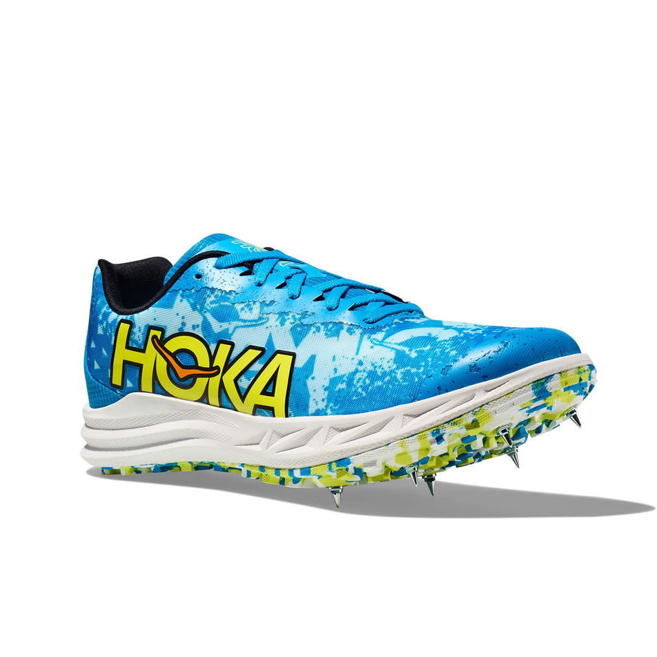 Lateral side of the right shoe from a pair of Hoka Unisex Crescendo XC Spikes in the Diva Blue/Evening Primrose colourway (7922066096290)
