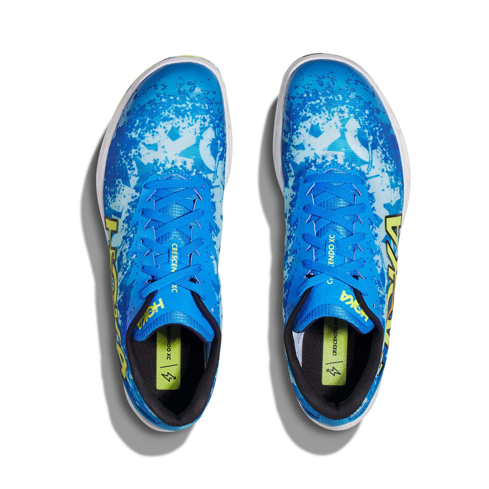 The uppers on a pair of Hoka Unisex Crescendo XC Spikes in the Diva Blue/Evening Primrose colourway (7922066096290)