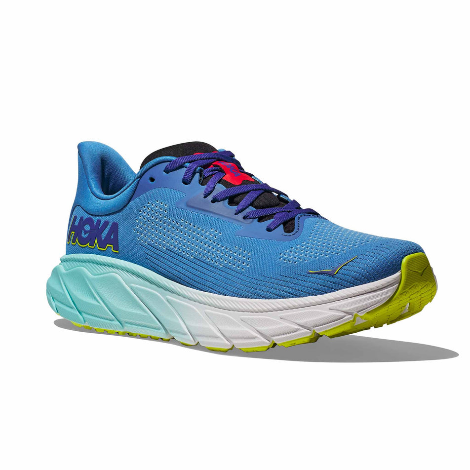 Lateral side of the right shoe from a pair of HOKA Men's Arahi 7 Running Shoes in the Virtual Blue/Cerise colourway (8246538174626)