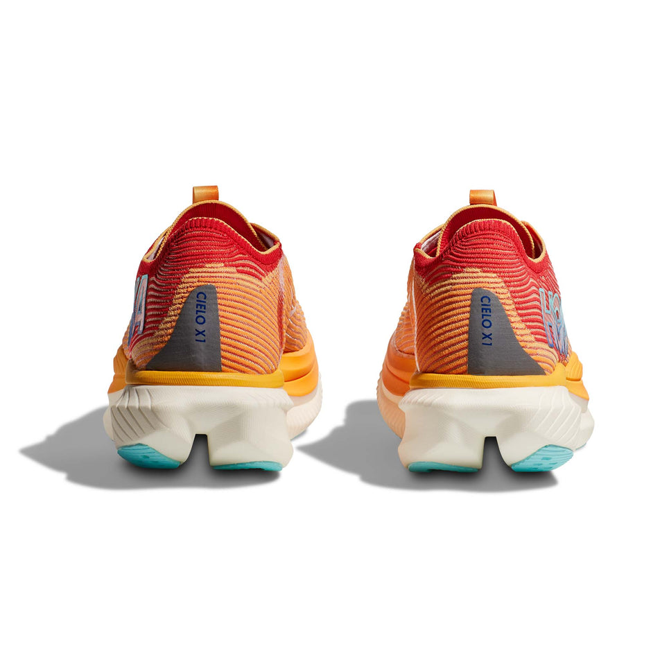 The back of a pair of HOKA Unisex Cielo X1 Running Shoes in the Cerise/Solar Flare colourway (8232930541730)