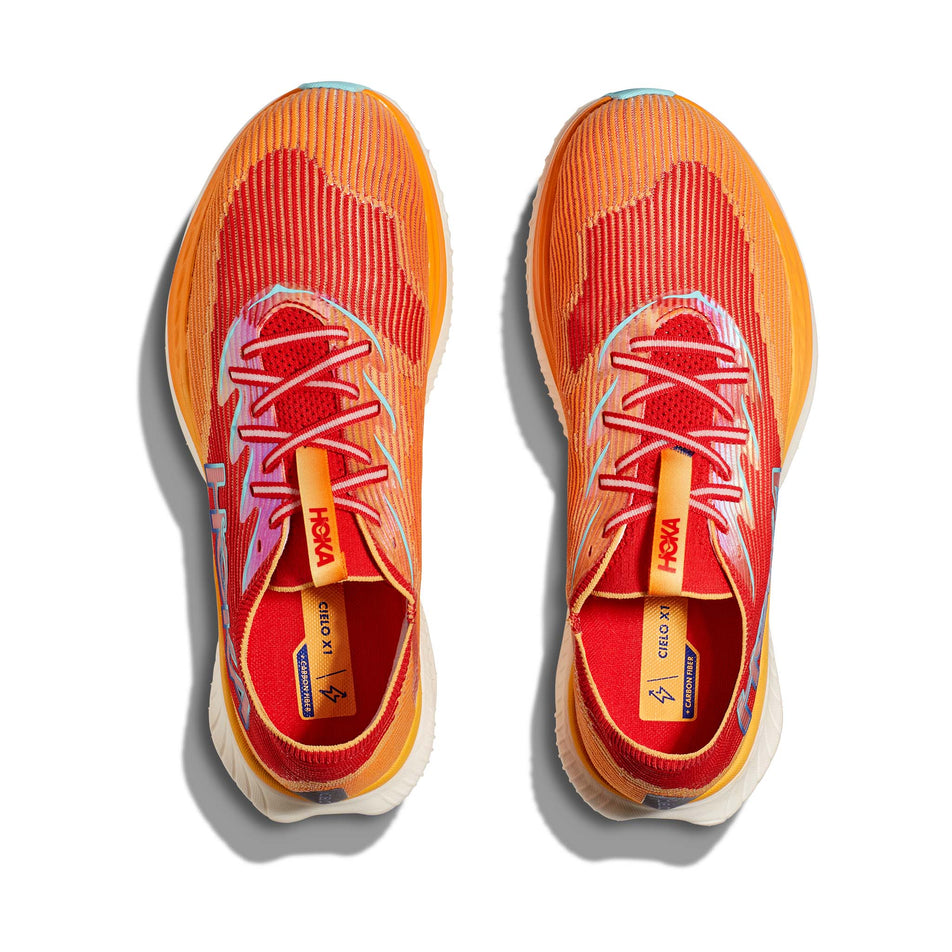The uppers on a pair of HOKA Unisex Cielo X1 Running Shoes in the Cerise/Solar Flare colourway (8232930541730)