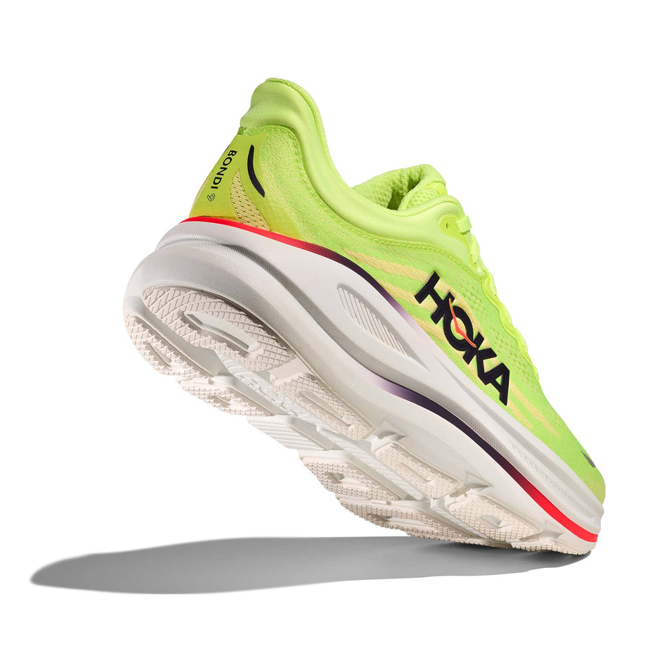 Lateral - and outsole - view of the right shoe from a pair of HOKA Men's Bondi 9 Running Shoes in the Neon Yuzu/Sunlight colourway.