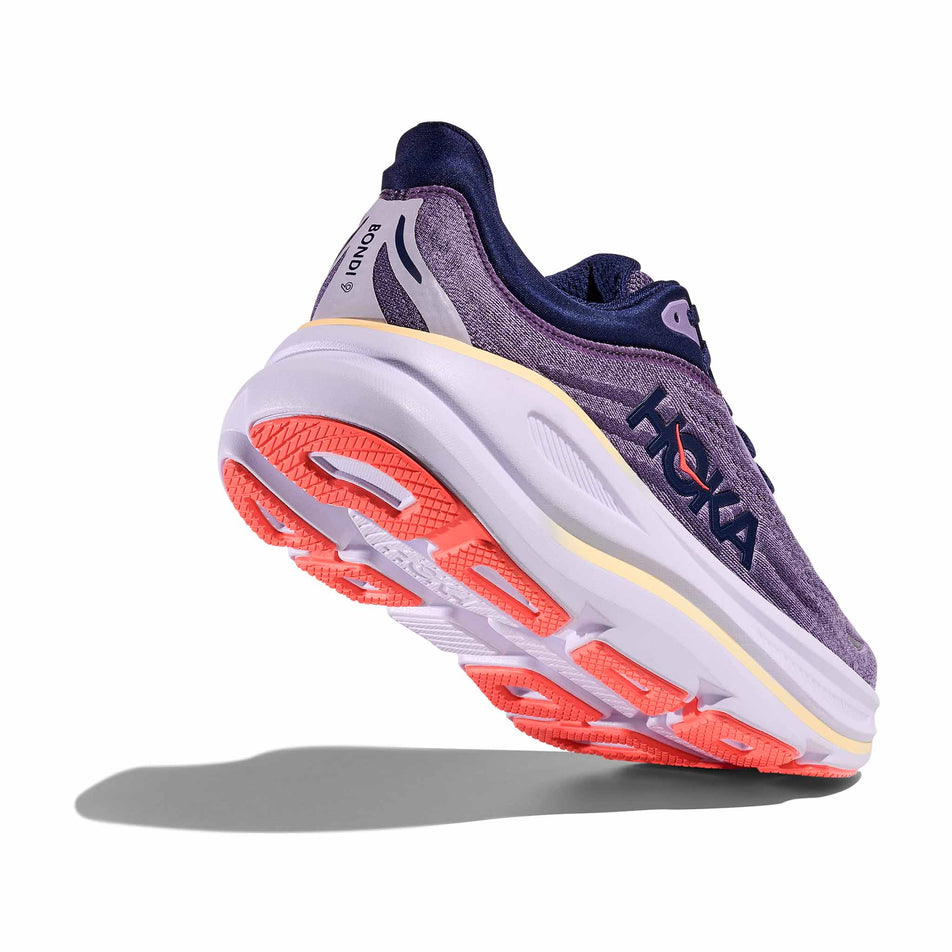 Lateral - and outsole - view of the right shoe from a pair of HOKA Women's Bondi 9 Running Shoes in the Berry Jam/Berry Patch colourway.
