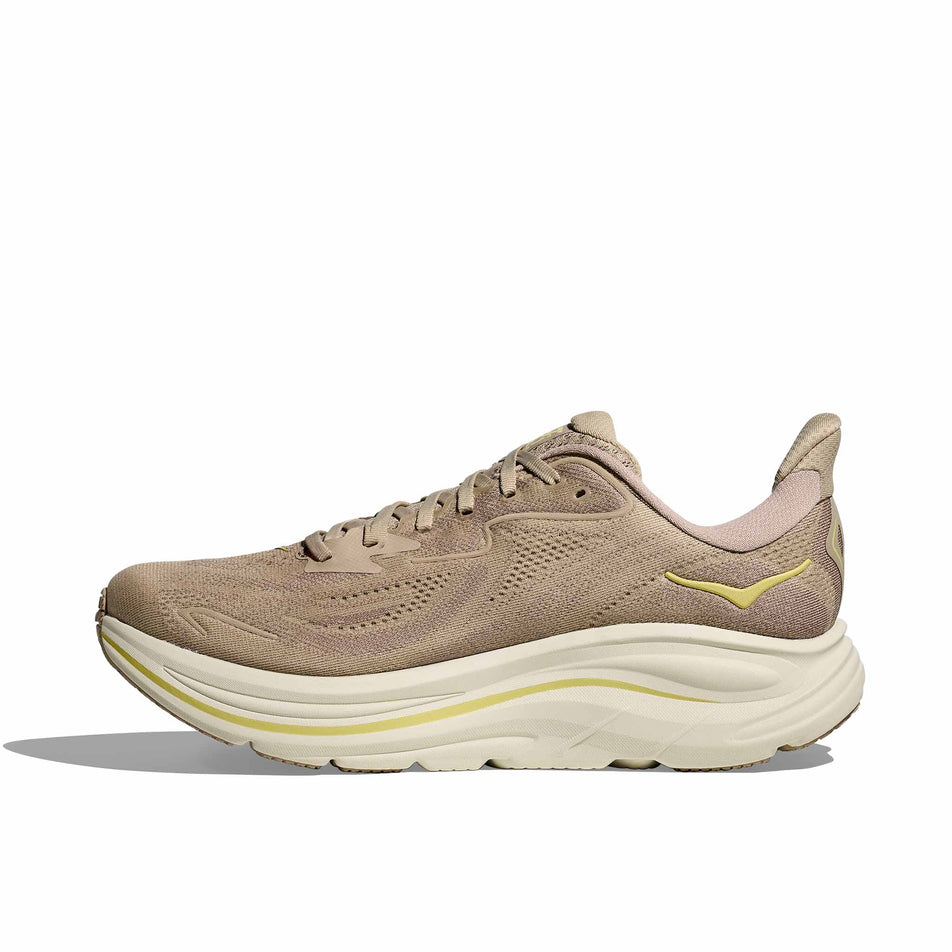 Medial view of the right shoe from a pair of HOKA Men's Clifton 10 Running Shoes in the Raw Linen/Stone colourway. (8689189421218)