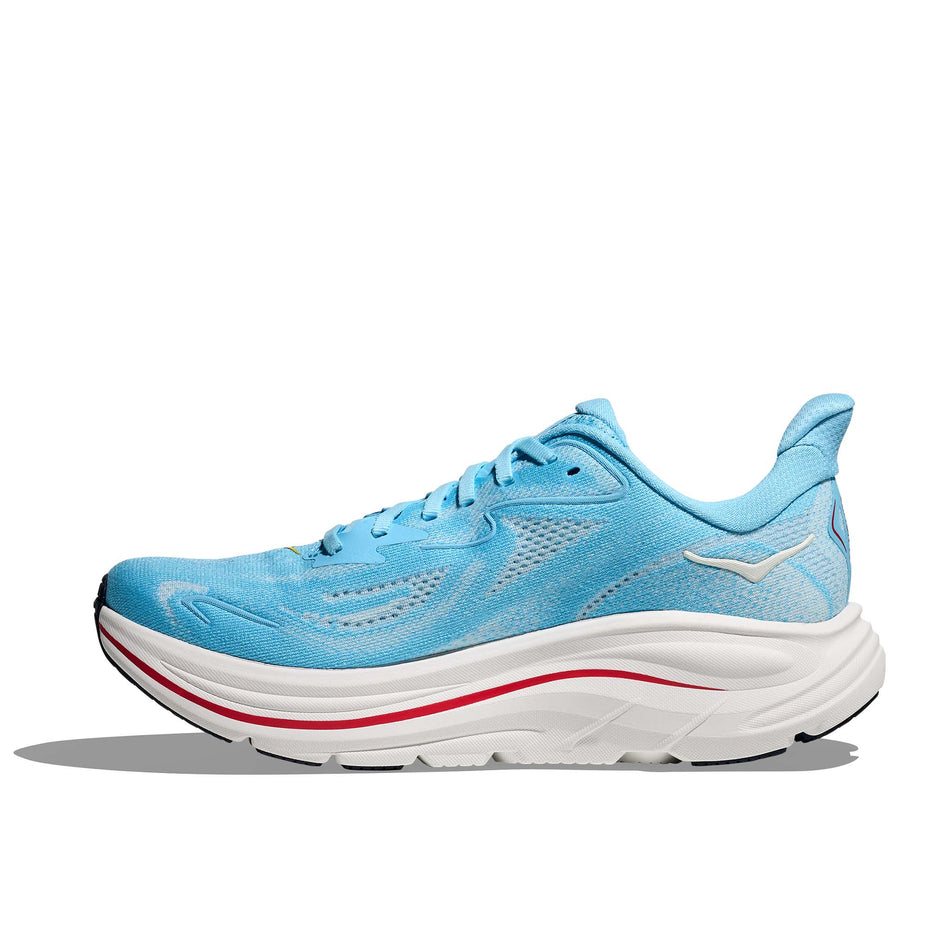 Medial view of the right shoe from a pair of HOKA Women's Clifton 10 Running Shoes in the Soaring Blue/Frost colourway.