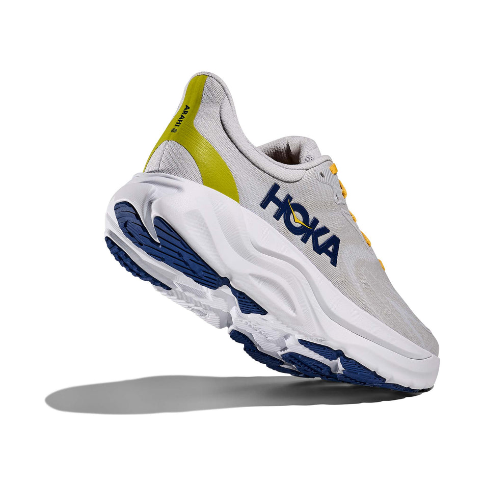 Lateral - and outsole - view of the right shoe from a pair of HOKA Men's Arahi 8 Running Shoes in the Stardust/Cosmic Grey colourway. (8689210949794)