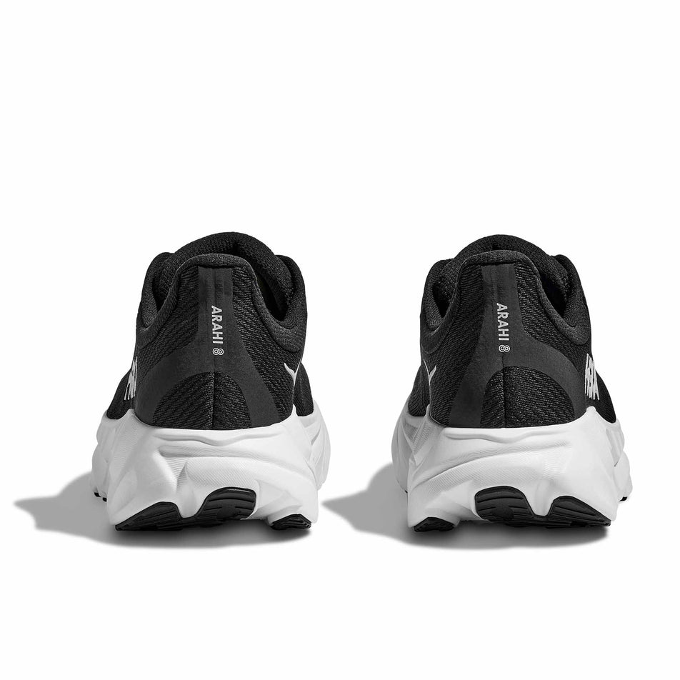 The back of a pair of HOKA Women's Arahi 8 Running Shoes in the Black/White colourway.