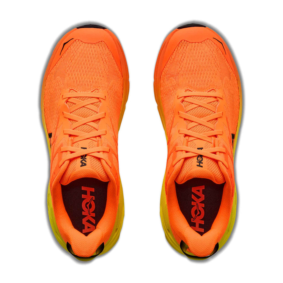 The uppers of a pair of HOKA Men's Challenger 8 Running Shoes in the Neon Tangerine/Hoka Citrus colourway.