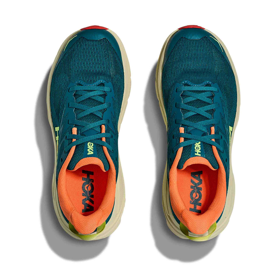 The uppers of a pair of HOKA Women's Challenger 8 Running Shoes in the Tidal Wave/Pampas Grass colourway.