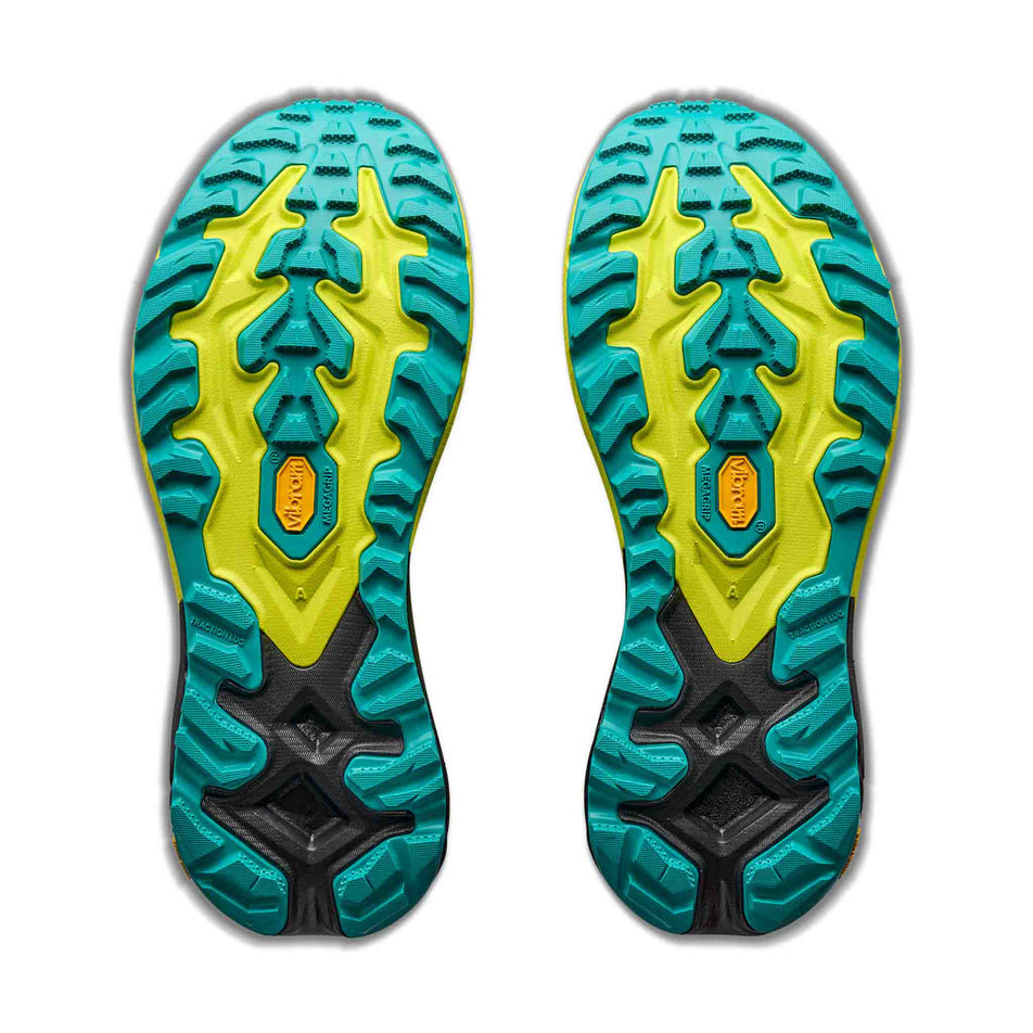 The outsoles of a pair of HOKA Men's Mafate 5 Trail Running Shoes in the Black/Hoka Citrus colourway.